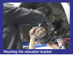Mounting the relocation bracket